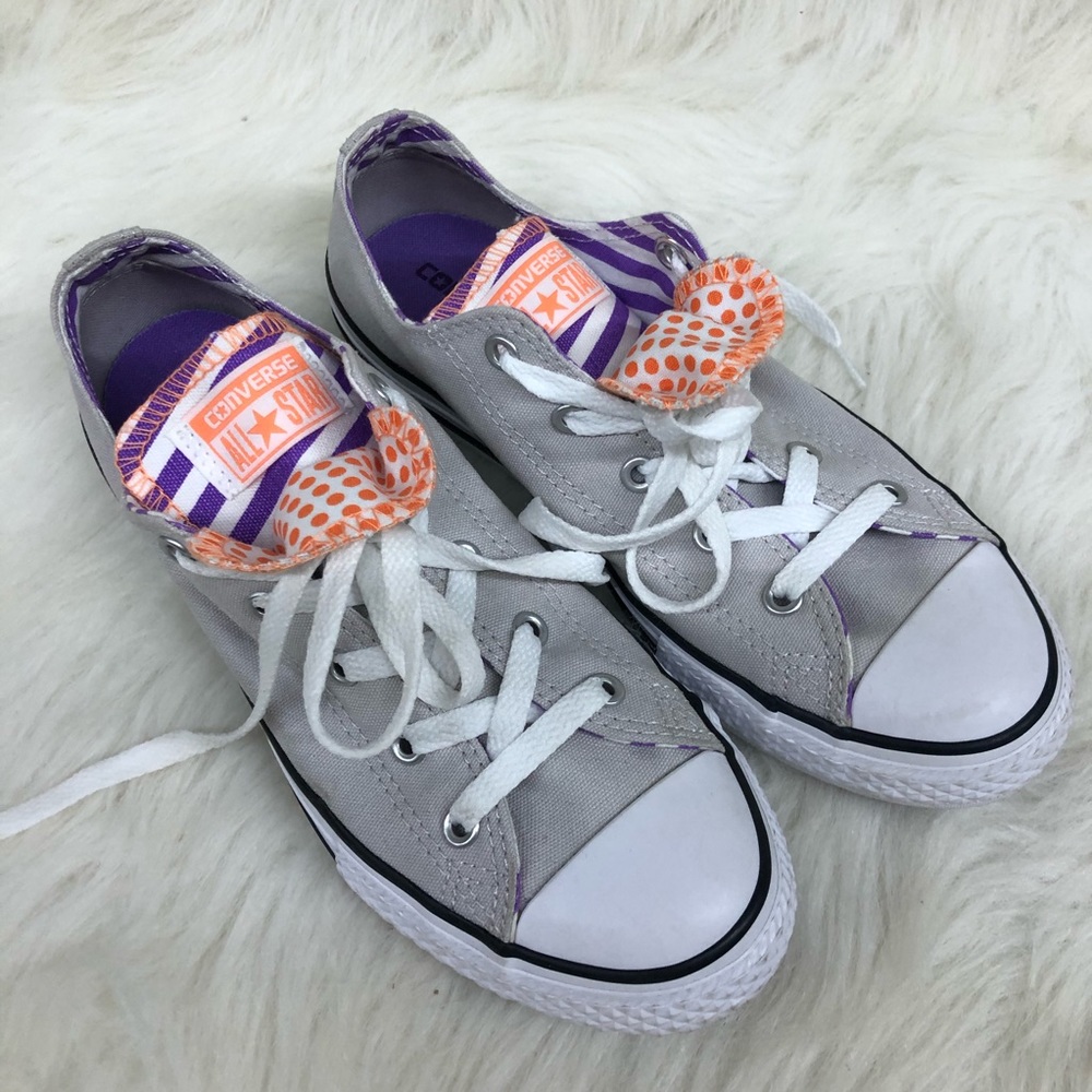Grey converse with orange and purple details